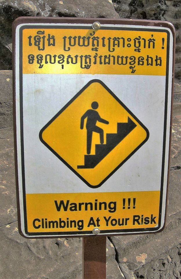 Khmer traffic sign warning to climb at your own risk